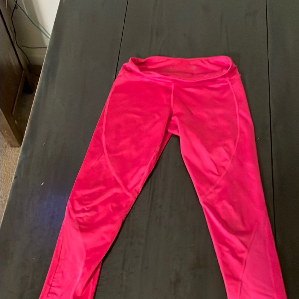 Kids Pink Leggings slight unraveling on one leg. See photo